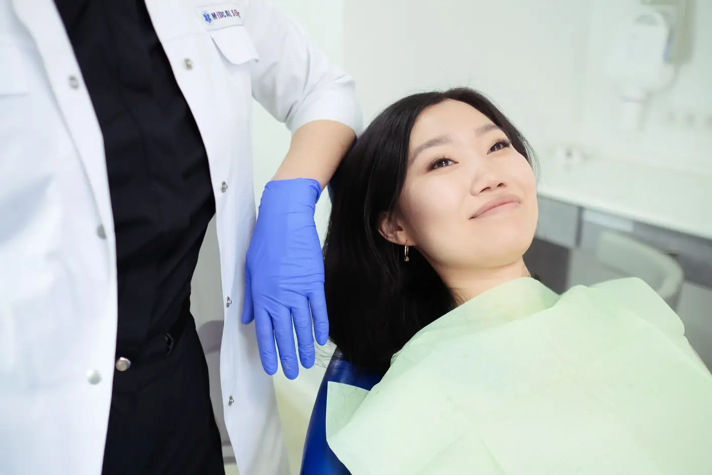 Patient relaxing in a dental chair during a check-up